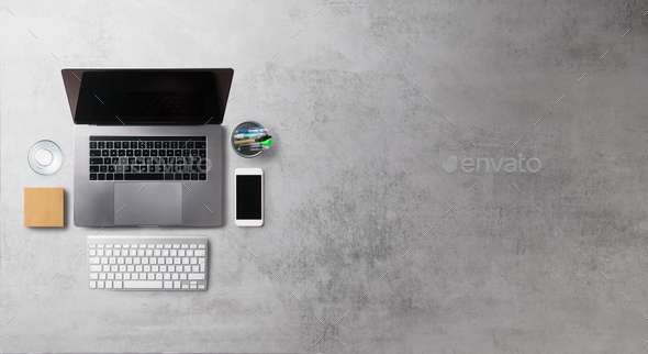 Desk, gadgets and office supplies. Flat lay. Copy space. Stock Photo by  halfpoint