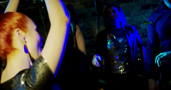 Foxy Hair Girl Dancing at a Nightclub alt