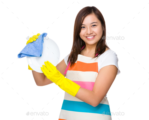 Asian Housewife wash the dish