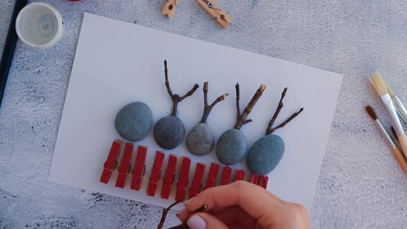 Making Diy Merry Christmas Deer on Greeting Card Postcard Made of Pebbles Sea Stones Clothespins and alt