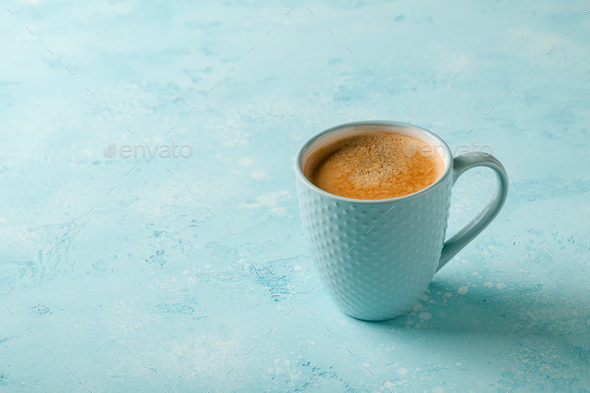 Cup of coffee on blue background Stock Photo by ff-photo | PhotoDune