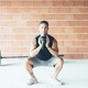 Fitness_man_doing_kettlebell_squat_exercise - PhotoDune Item for Sale