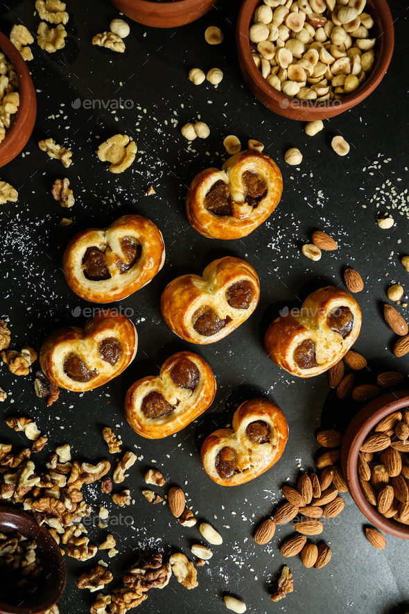 pastries with fig dough walnuts hazelnuts peanut sesame top view