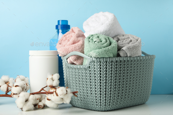 Laundry accessories on white table against blue background Stock Photo by  AtlasComposer