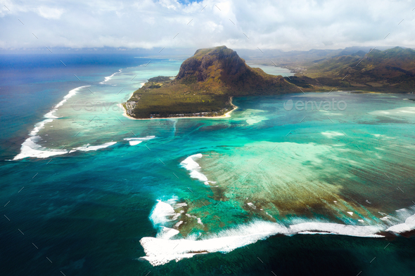 A bird\'s-eye view of Le Morne Brabant, a UNESCO world heritage site.Coral reef of the island