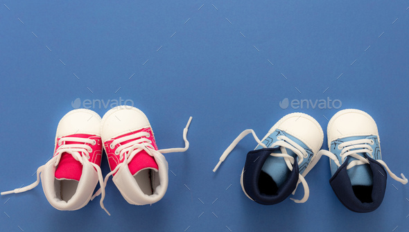Baby Shoes On Blue Color Background Top View Stock Photo By Rawf8