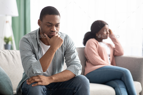 Upset black couple young man and woman having relationships crisis
