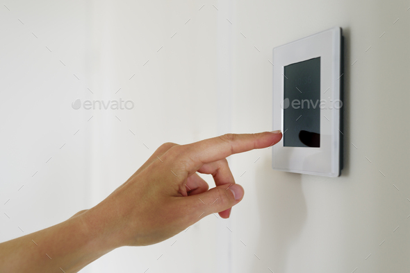 Hand using Air ventilation controller with display