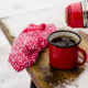 Red mug with hot coffee or tea drink on snow in winter Stock Photo by  molenira