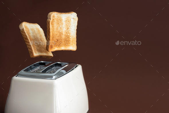 Slices Of Toast Jumping Out Of The Toaster Stock Photo By Tataks Photodune