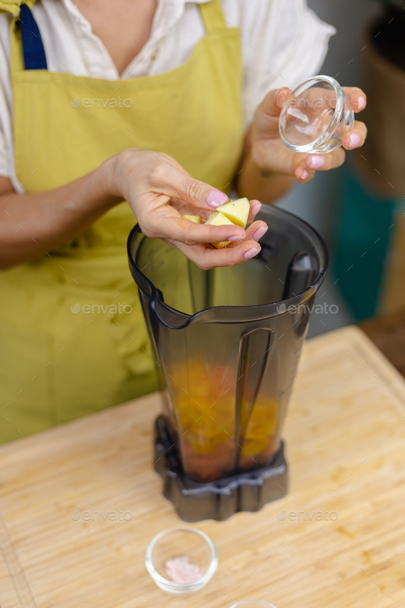 Chia pudding making process. Making healthy jam with mango and papaya