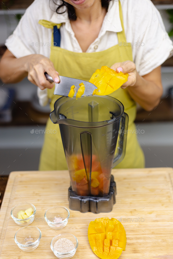 Chia pudding making process. Making healthy jam with mango and papaya