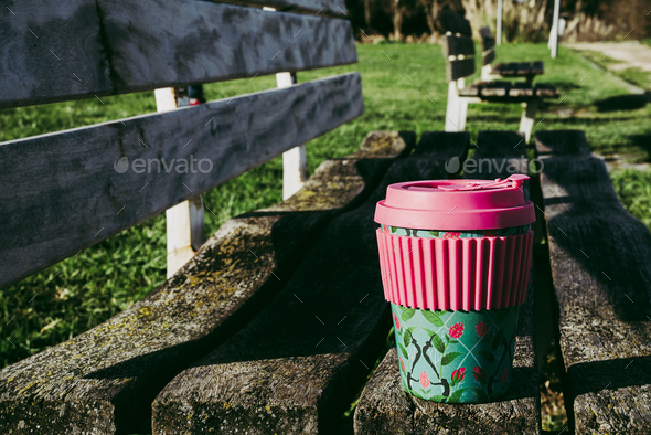 Sustainable bamboo coffee cup in the park - Stock Photo - Images