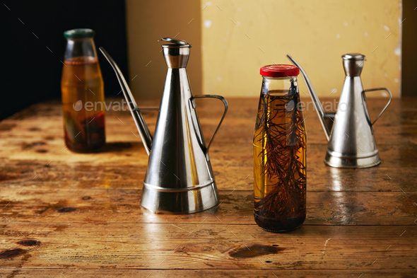 Olive oil with herbs and steel dispensers