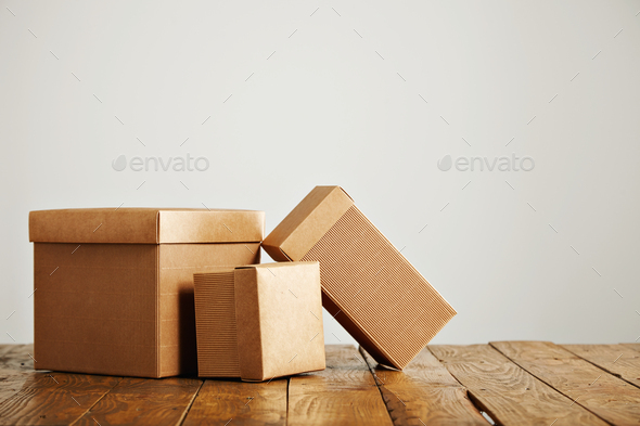 Download Mockups Of Blank Brown Corrugated Cardboard Boxes Stock Photo By Bublikhaus