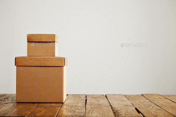 Download Mockups Of Blank Brown Corrugated Cardboard Boxes Stock Photo By Bublikhaus