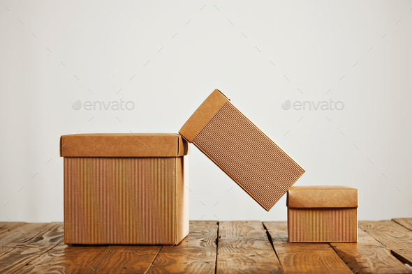 Download Mockups Of Blank Brown Corrugated Cardboard Boxes Stock Photo By Bublikhaus