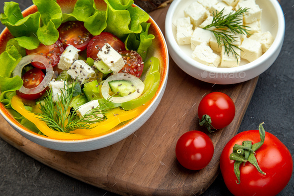 front close view vegetable salad with cheese cucumbers and tomatoes on dark background diet meal
