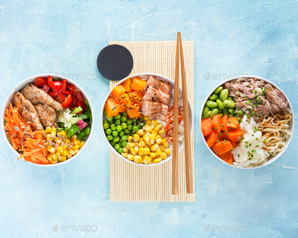 Three Poke bowls flamed salmon, pulled pork, vegan protein alternative heura, rice, noodles.