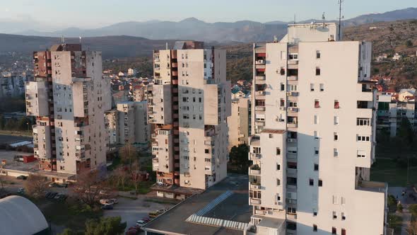 High-rise apartment buildings in a big city: residential skyscrapers, urban density and planning alt
