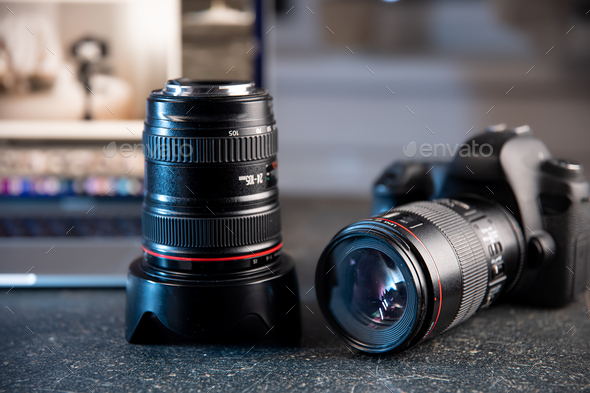 Close up of professional digital camera and lens.