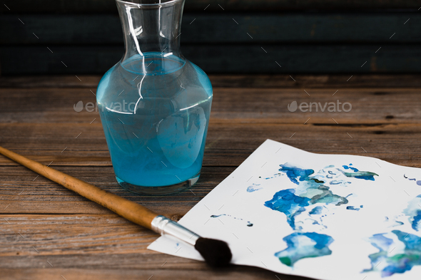 artist tools, paper with blue paint - Stock Photo - Images