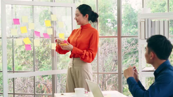 Business People Work on Project Planning Board alt