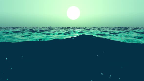 Deep sea surface with waves and sun shining