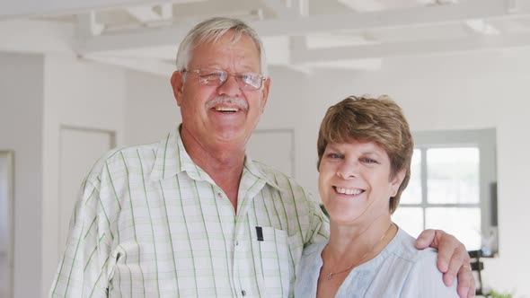 Caucasian senior couple spending time together socialising before their ballroom dancing class alt