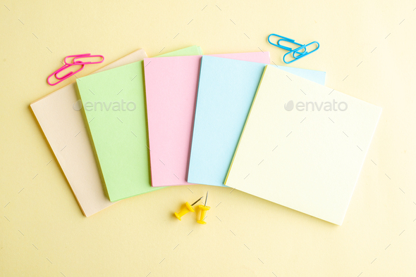 top view colorful paper notes on light background copybook bank business school office notepad pen