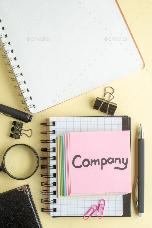 top view company written note along with colorful little paper notes on light background notepad job