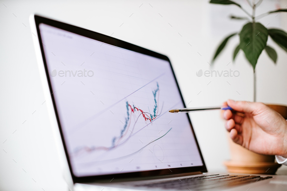 bitcoin price graph data trend analysis on laptop screen - Stock Photo - Images