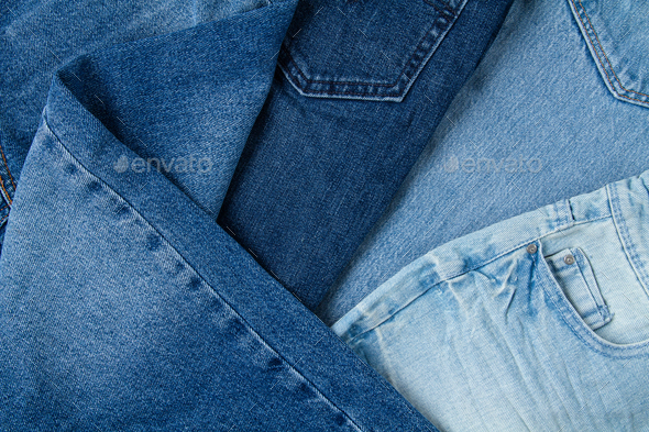 Flat lay of classic blue jeans. Urban outfit, basic essencial wardrobe, shopping concept. Top view
