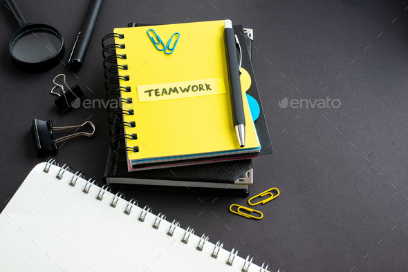 front view teamwork note with notepads on dark background business office work plan busy bank