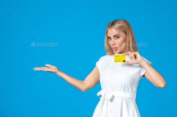 front view female worker holding yellow bank card on blue background office business document money
