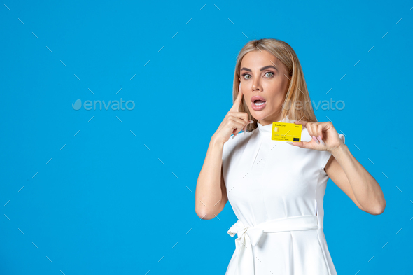 front view female worker holding yellow bank card on blue background office business money worker