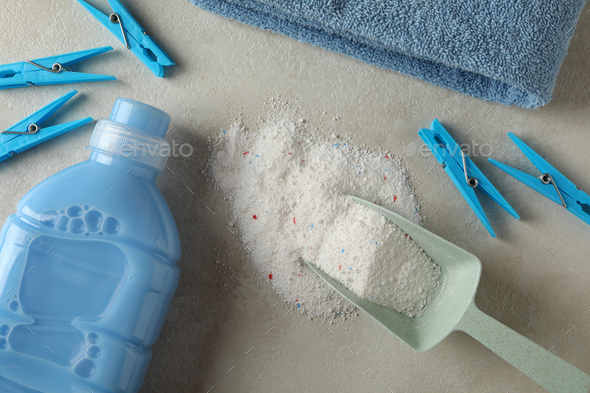 Laundry accessories on white table against blue background Stock Photo by  AtlasComposer