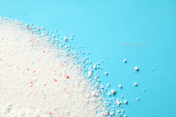 Washing powder on blue background, space for text Stock Photo by  AtlasComposer