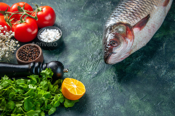 front view fresh raw fish with greens and tomatoes on dark background food health water fish color