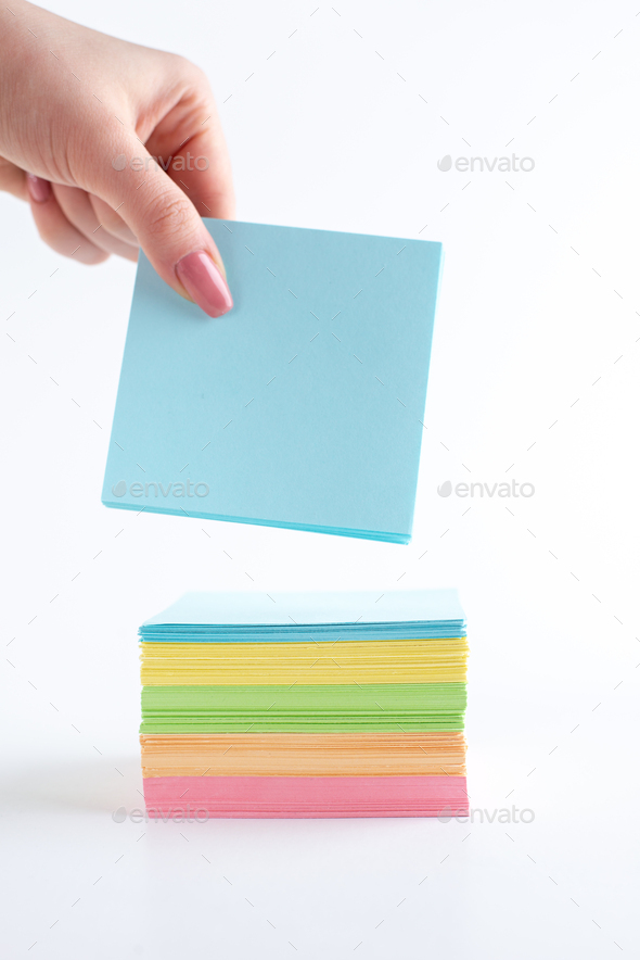 front view colorful paper stickers taken by female on white background color copybook note school