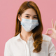 Young Asia girl wearing medical face mask gesturing ok sign with dressed in casual cloth. - PhotoDune Item for Sale