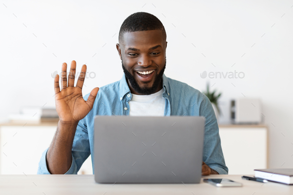 Video Call. Positive Young Black Guy Having Web Conference On Laptop - Stock Photo - Images
