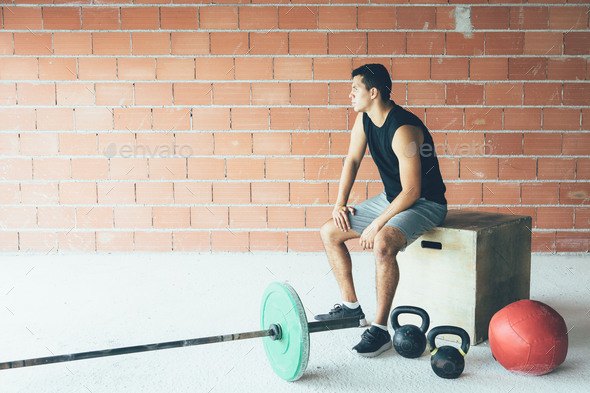 Relaxed_man_at_gym - Stock Photo - Images