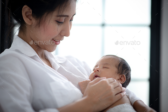 Download Asian Parent Hands Holding Newborn Baby Fingers Close Up Mother S Hand Stock Photo By Ckstockphoto