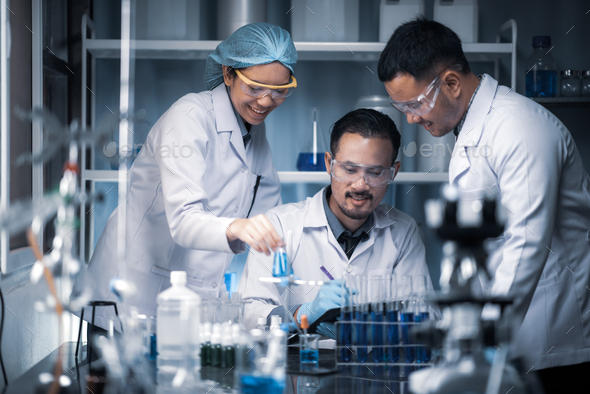 Team of Medical Research Scientists Collectively Working on a New Generation - Stock Photo - Images