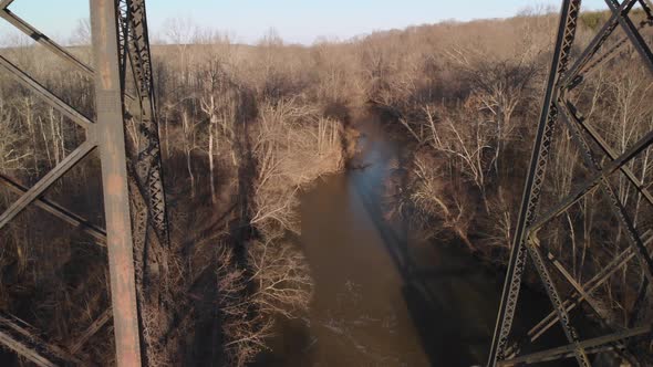 Reversing from the muddy Appomattox River to reveal High Bridge Trail, a reconstructed Civil War rai alt
