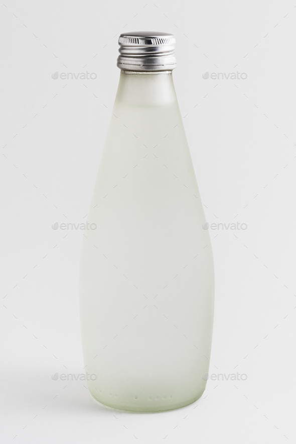 Download Water In A Translucent Glass Bottle Mockup Stock Photo By Rawpixel