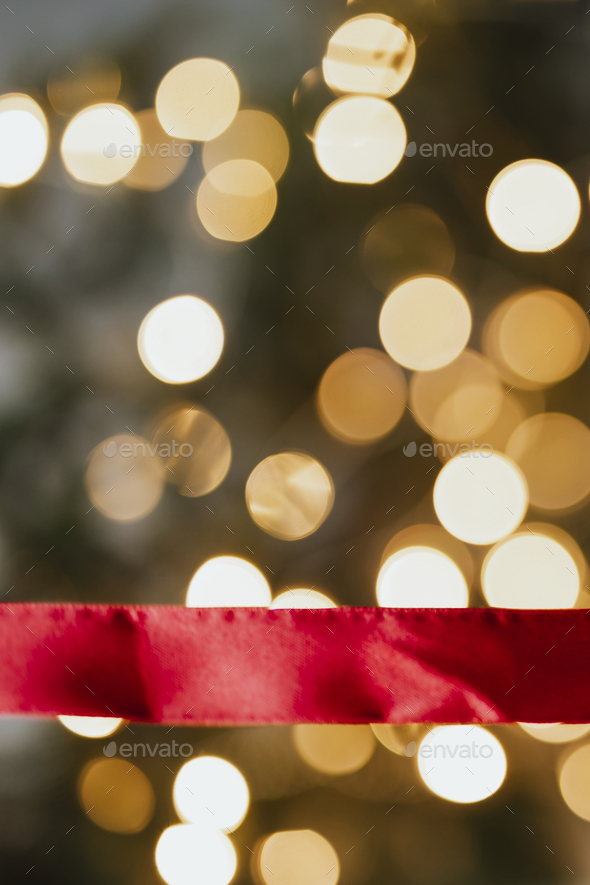 Red ribbon on a bokeh background  pinterest banner - Stock Photo - Images