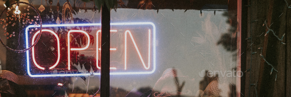Neon open sign in the window of a restaurant - Stock Photo - Images