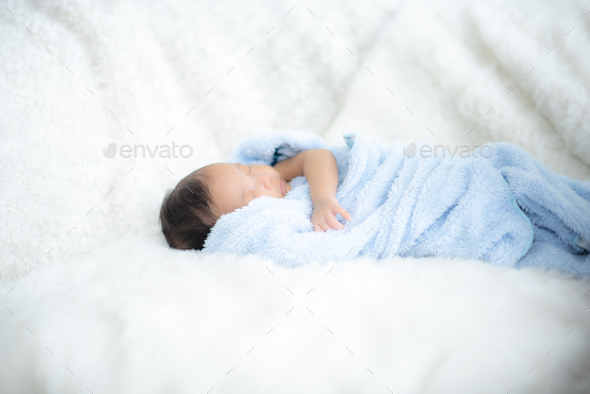 Baby sleeping clearance on soft mattress